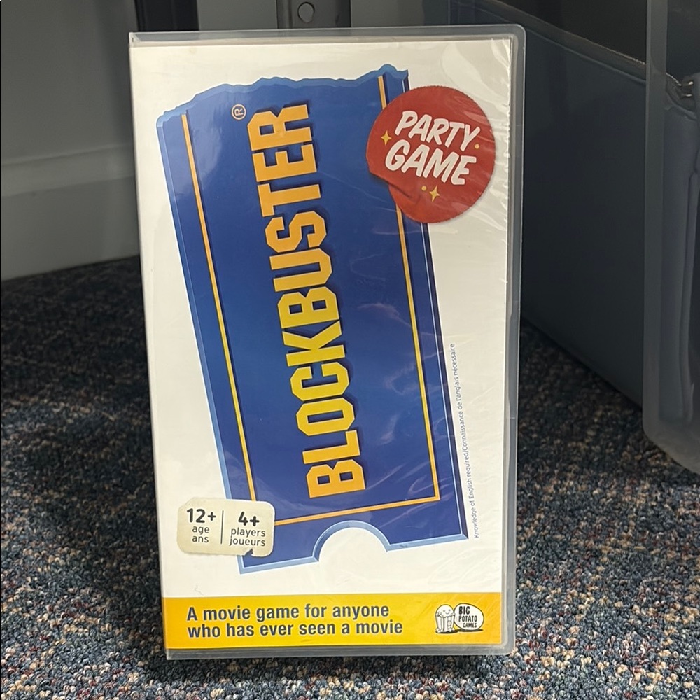 Blockbuster party game. Box opened but everything inside unopened and wrapped